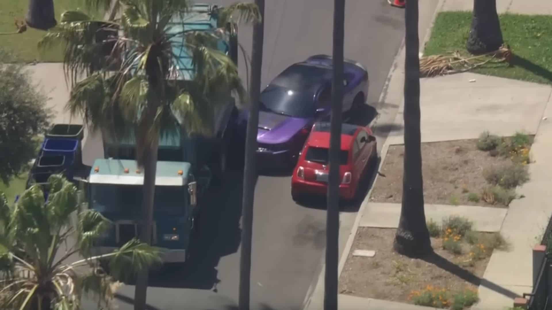 Dodge Charger Fleeing Police Tries Pushing A Garbage Truck Out Of The Way