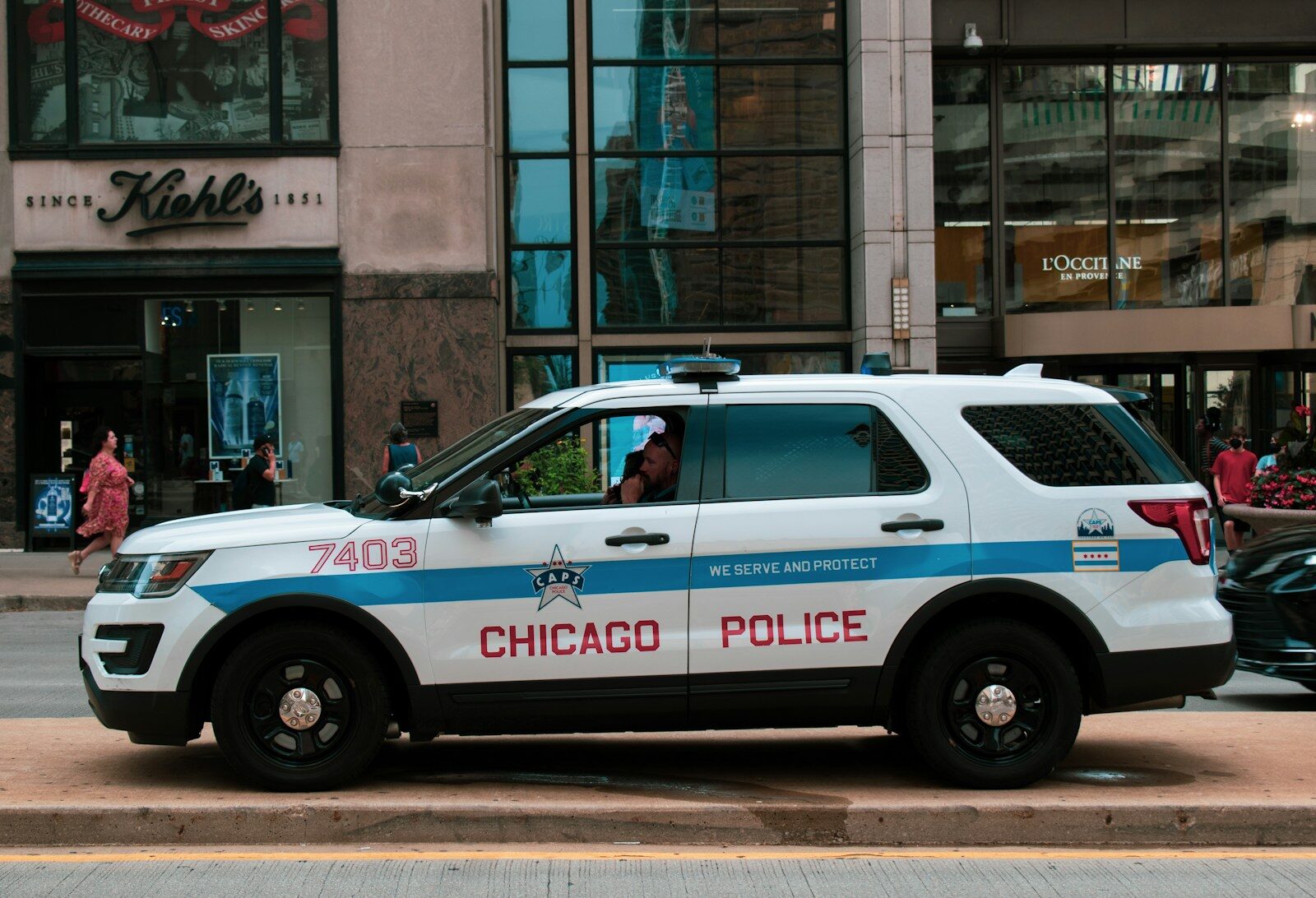 a police car parked on the side of the road