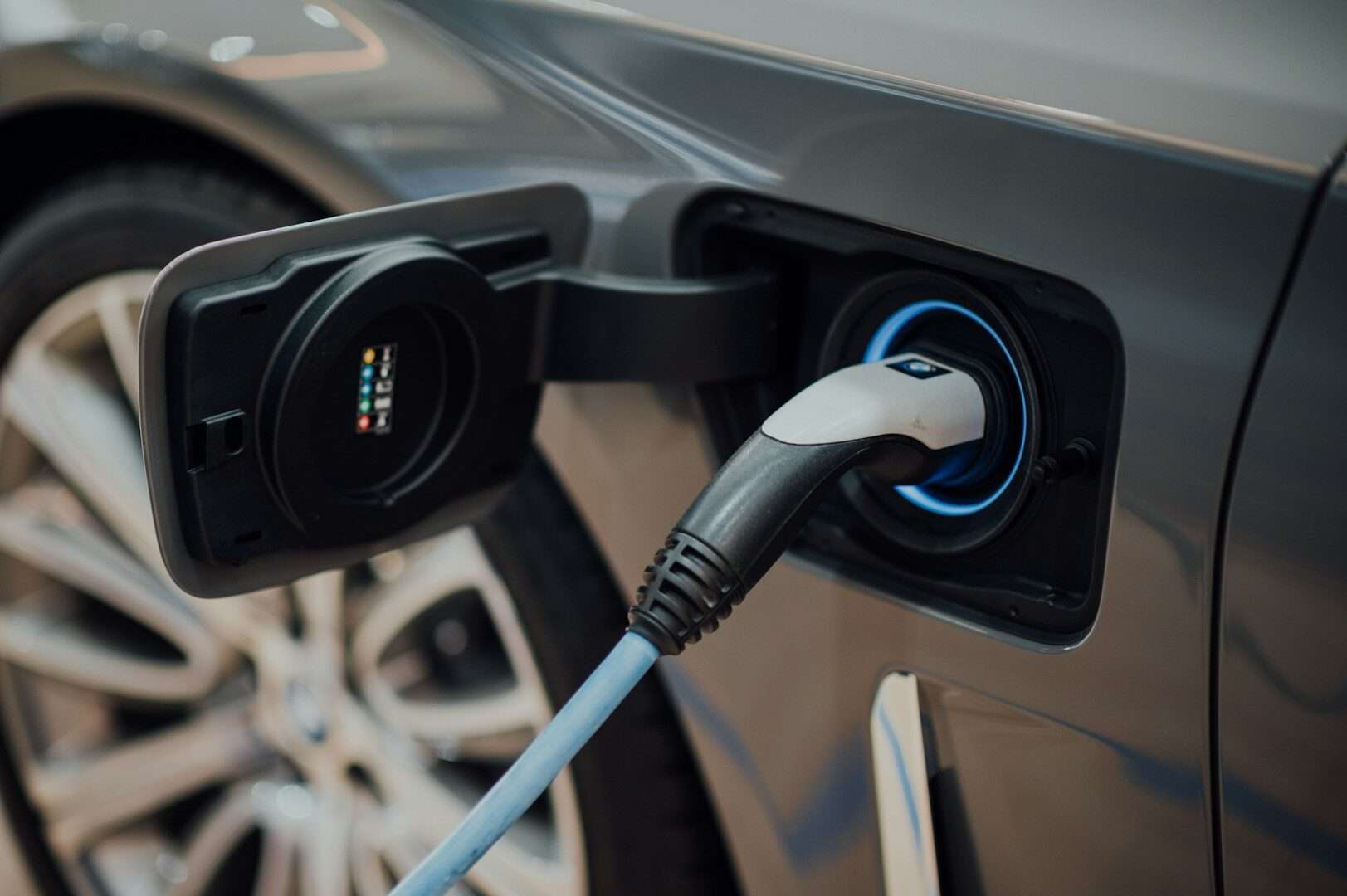 Electric car plugged into a charging station
