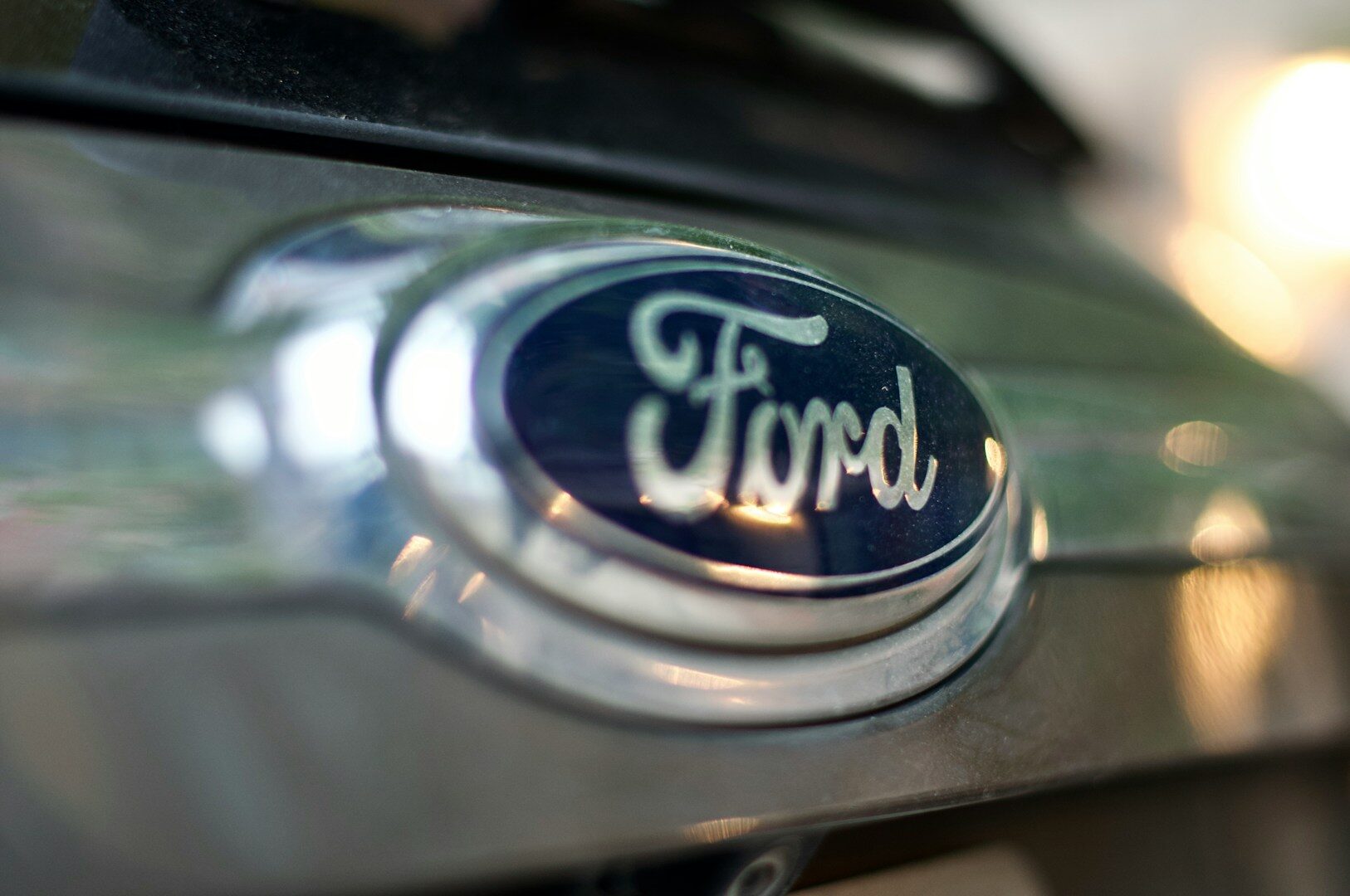 Ford emblem, symbol of the Quality Comes First campaign