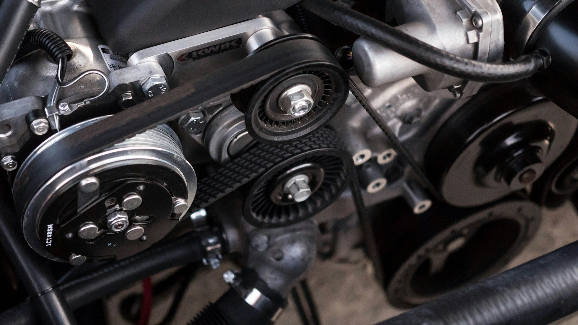 Engine bay showing the timing belt or chain area