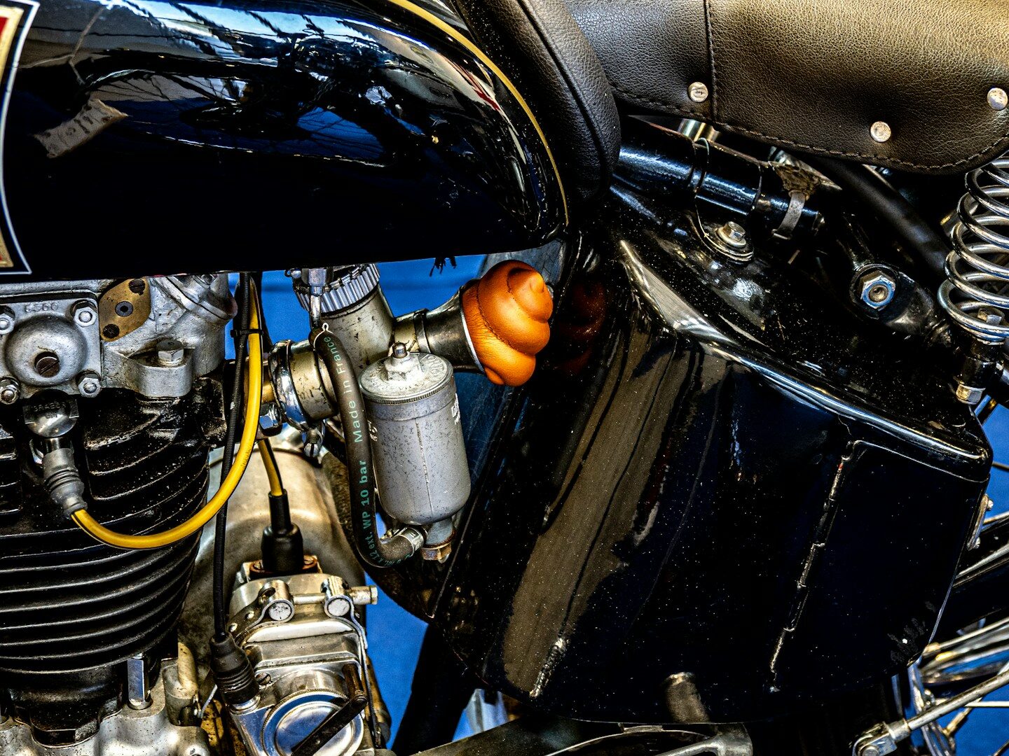 Close-up of a vintage black motorcycle engine detail.