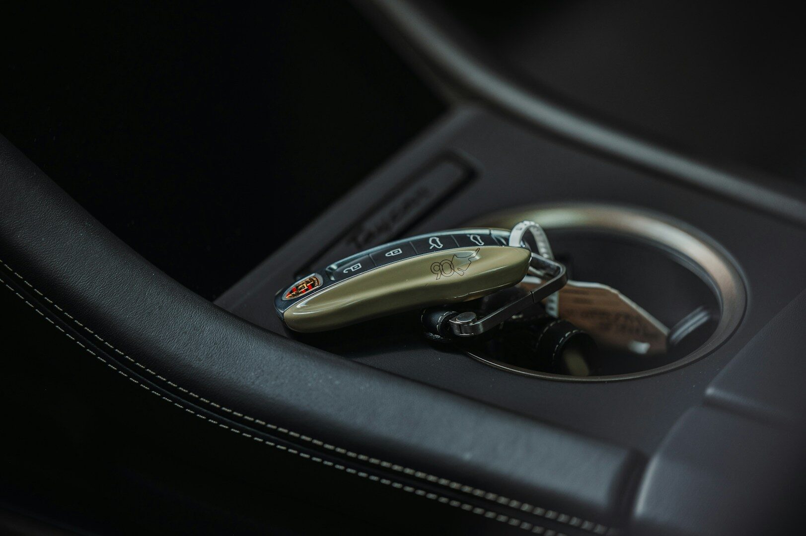 Close-up of a car key in the ignition, representing the starter circuit used by GPS kill switch devices