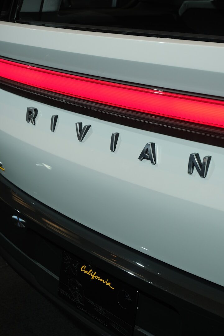A close up of the rear of a white car