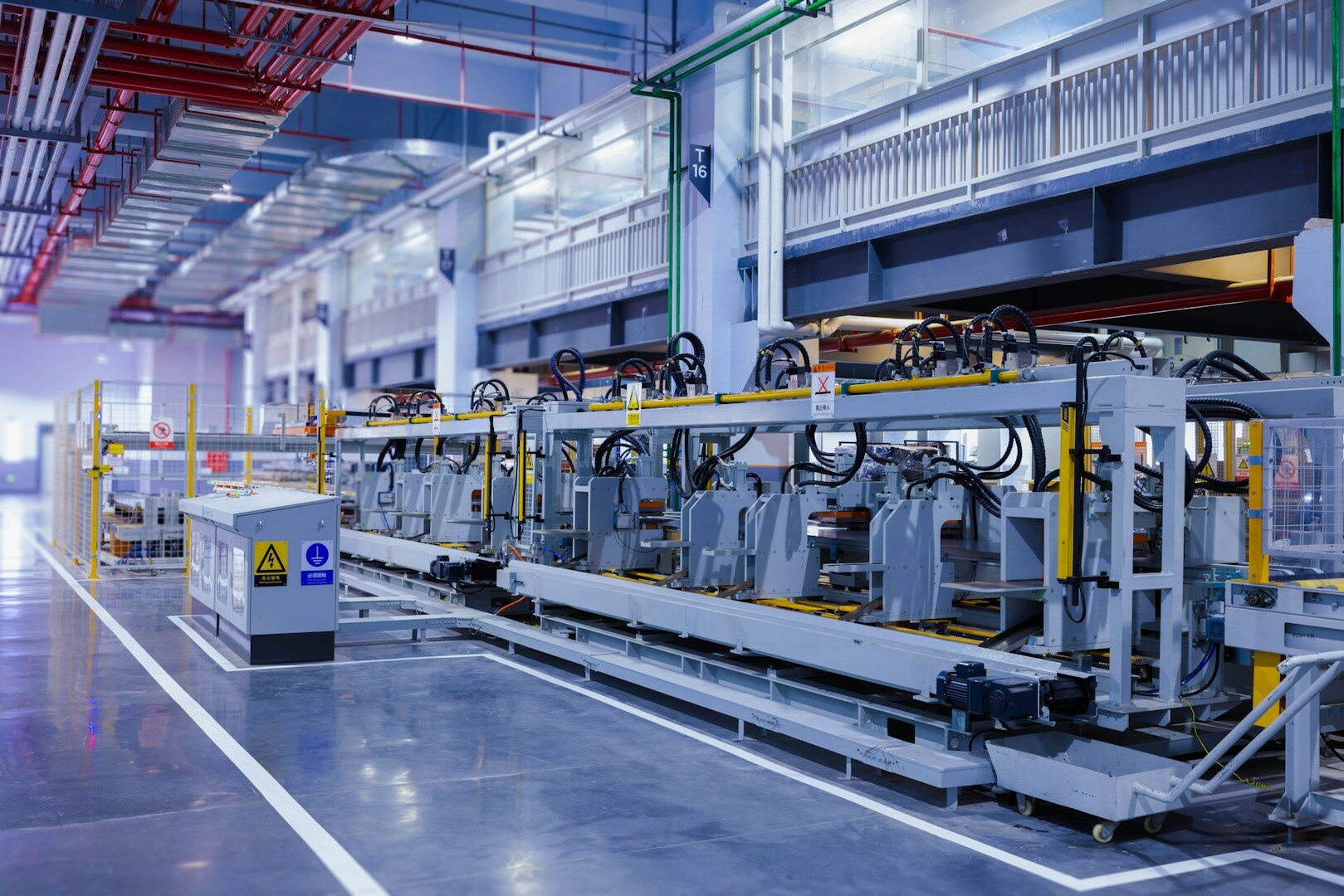 GM Ultium Cells battery manufacturing plant interior showing production line machinery