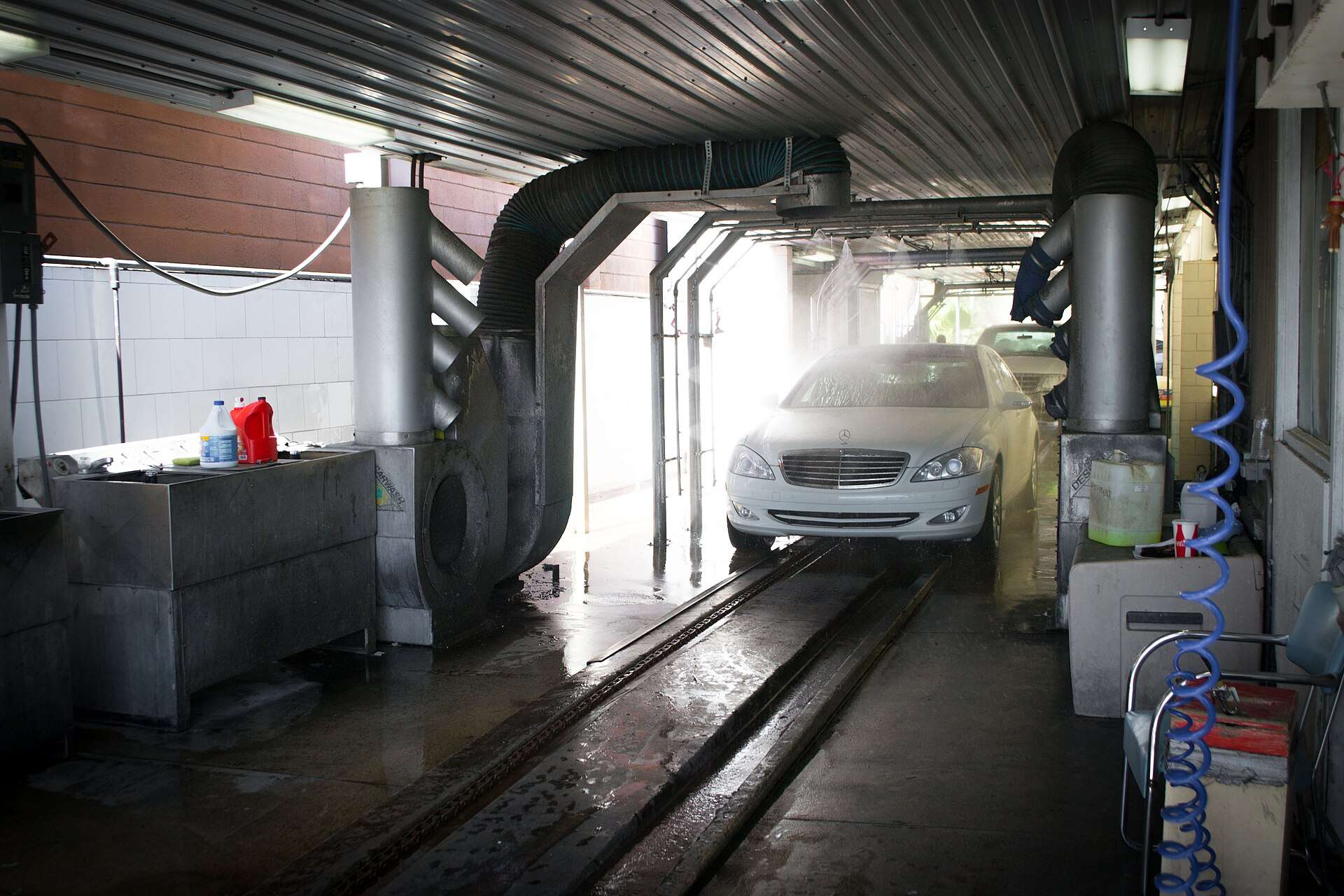 Car exiting the dryer section of an automated car wash tunnel