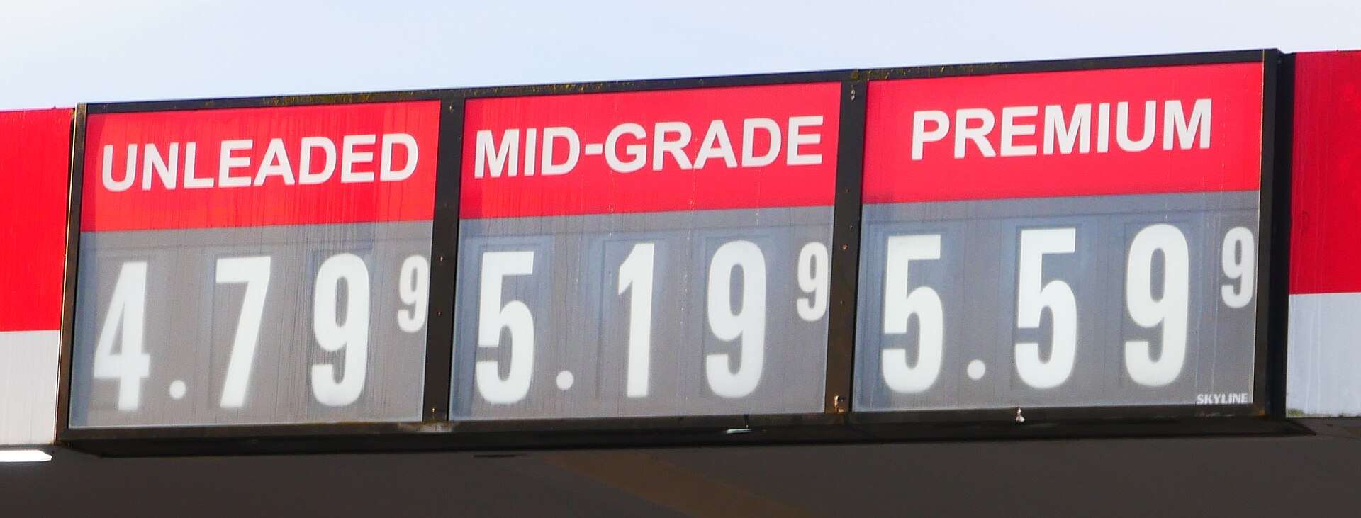 Roadside fuel price sign showing gasoline and diesel prices