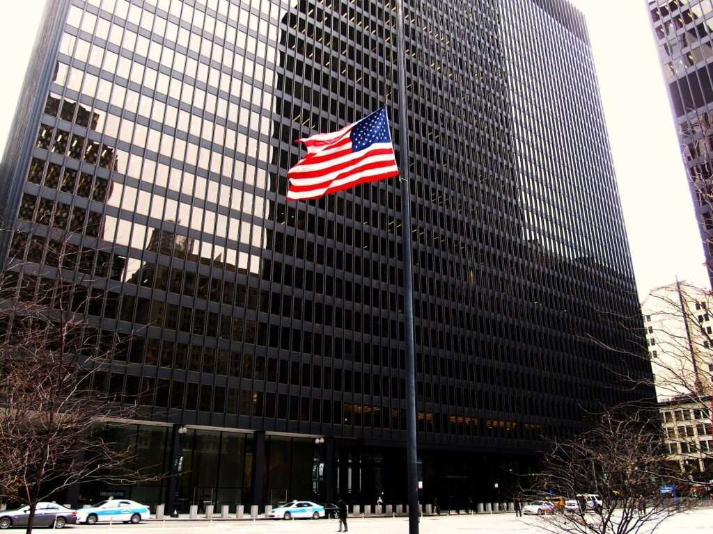 The Dirksen United States Courthouse in downtown Chicago with an American flag out front