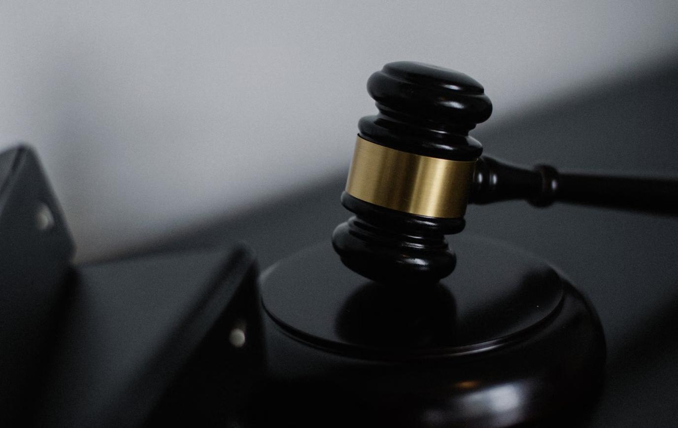 Gavel representing a federal regulatory investigation