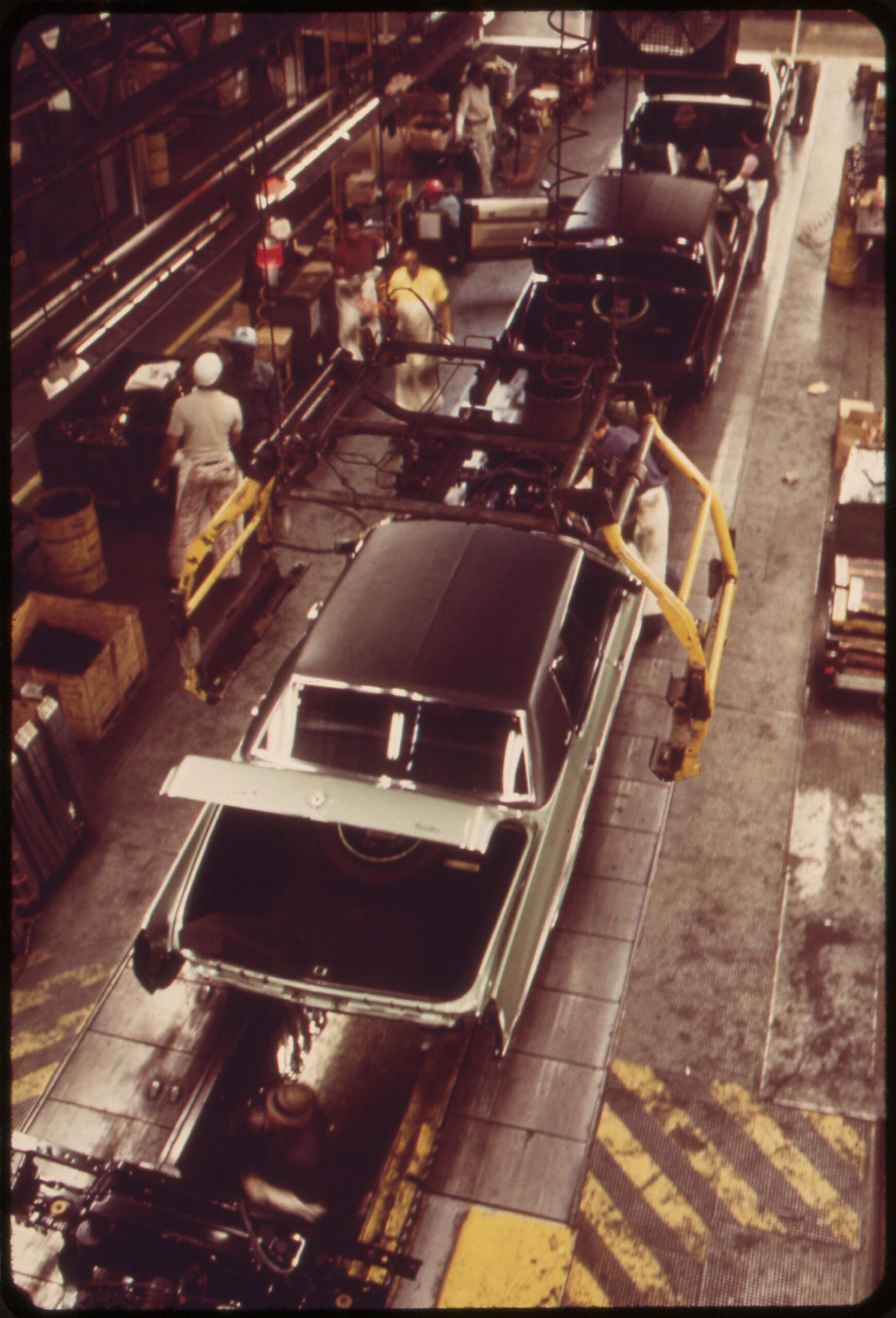 Car bodies lowered onto frames on a GM Cadillac assembly line in Detroit in 1973, three years after the 1970 GM strike