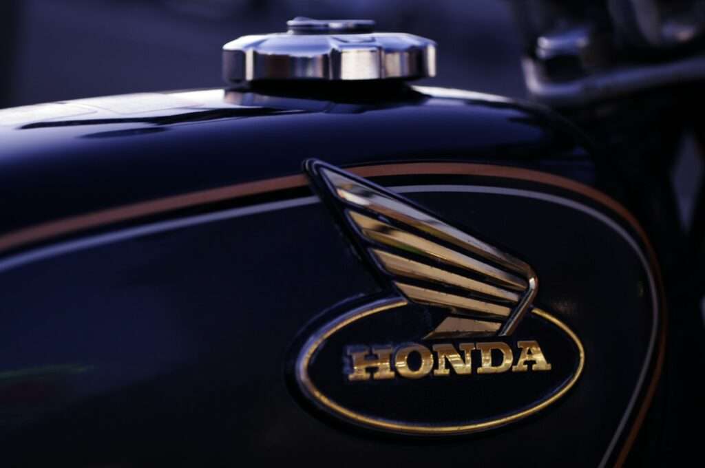 Honda wing badge on the fuel tank of a Honda Benly CD90 motorcycle