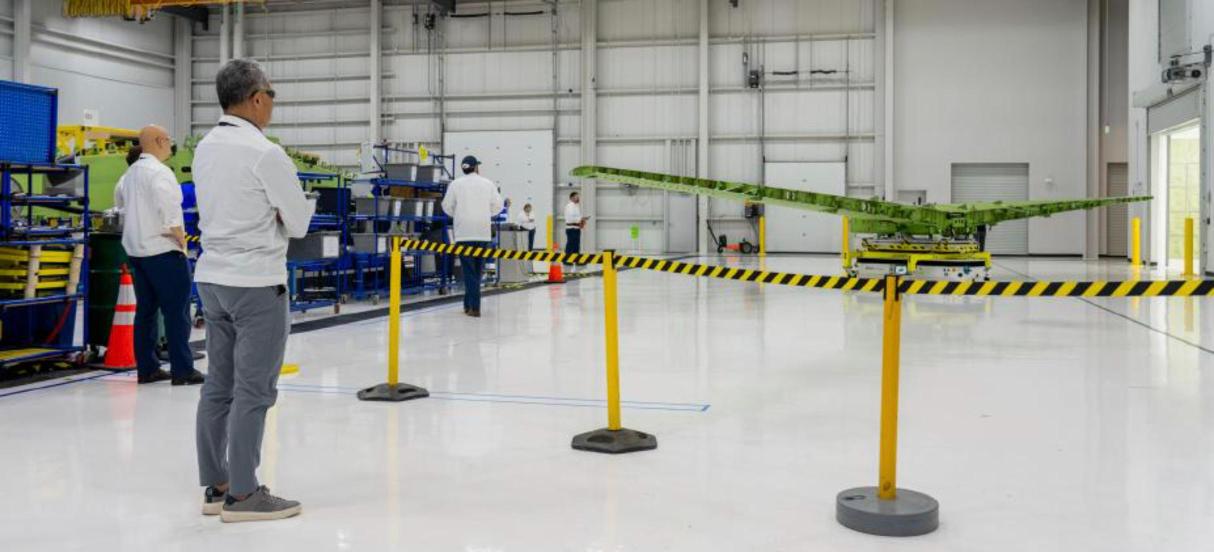 The first completed HondaJet Echelon wing structure on a transport fixture inside Honda Aircraft Company's Greensboro, North Carolina facility