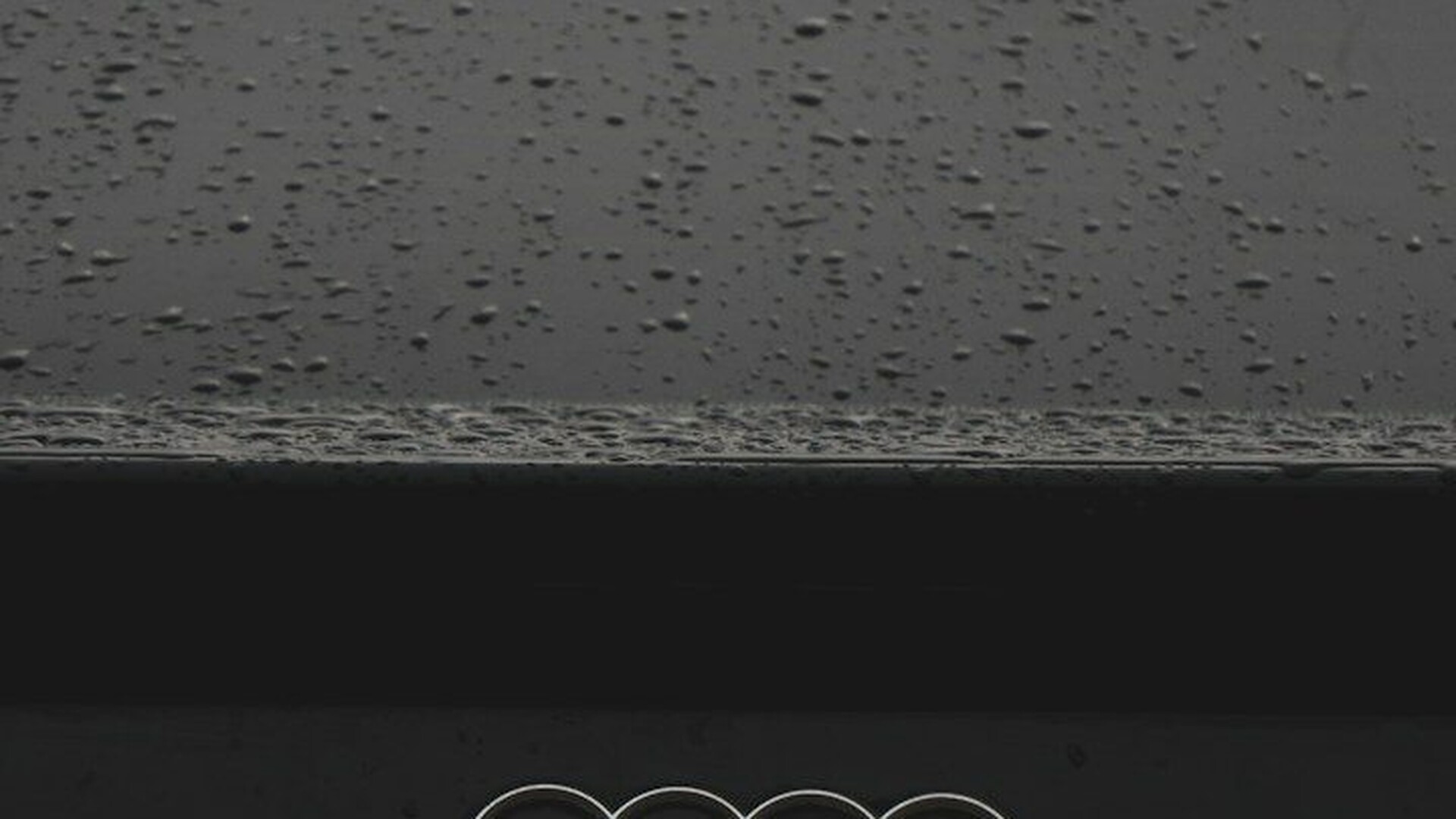 a close up of an audi emblem on a car