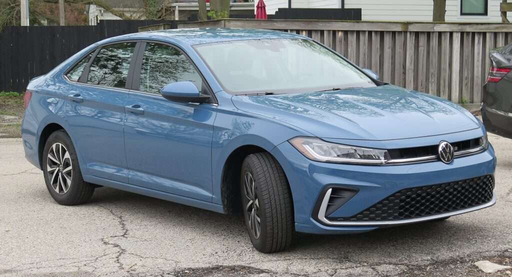A 2025 Volkswagen Jetta sedan in Monterey Blue Pearl, front three-quarter view