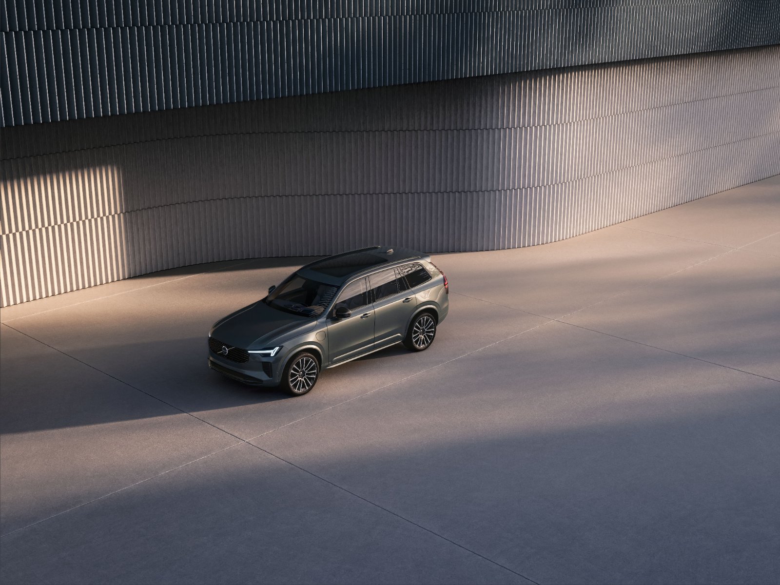 The Volvo XC90 long-range plug-in hybrid, photographed front three-quarter, announced 15 September 2026