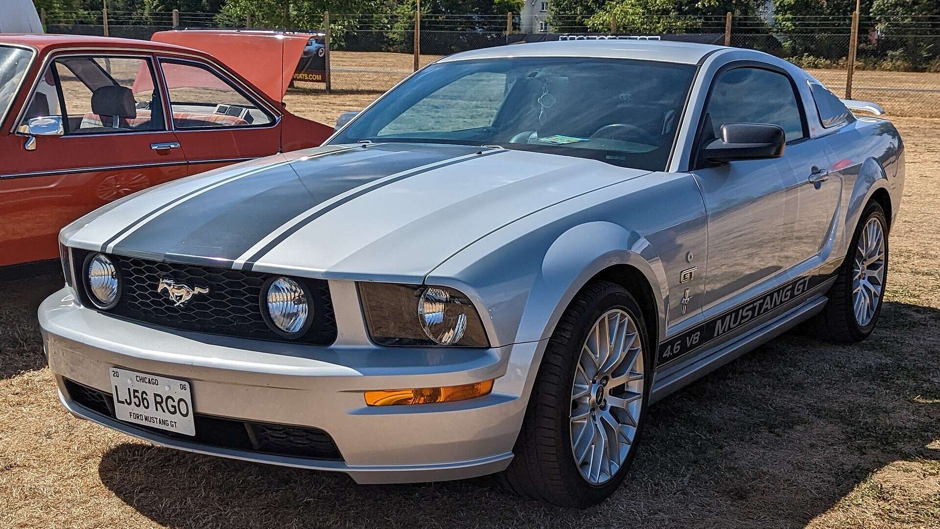 Silver 2006 Ford Mustang GT coupe with black stripes