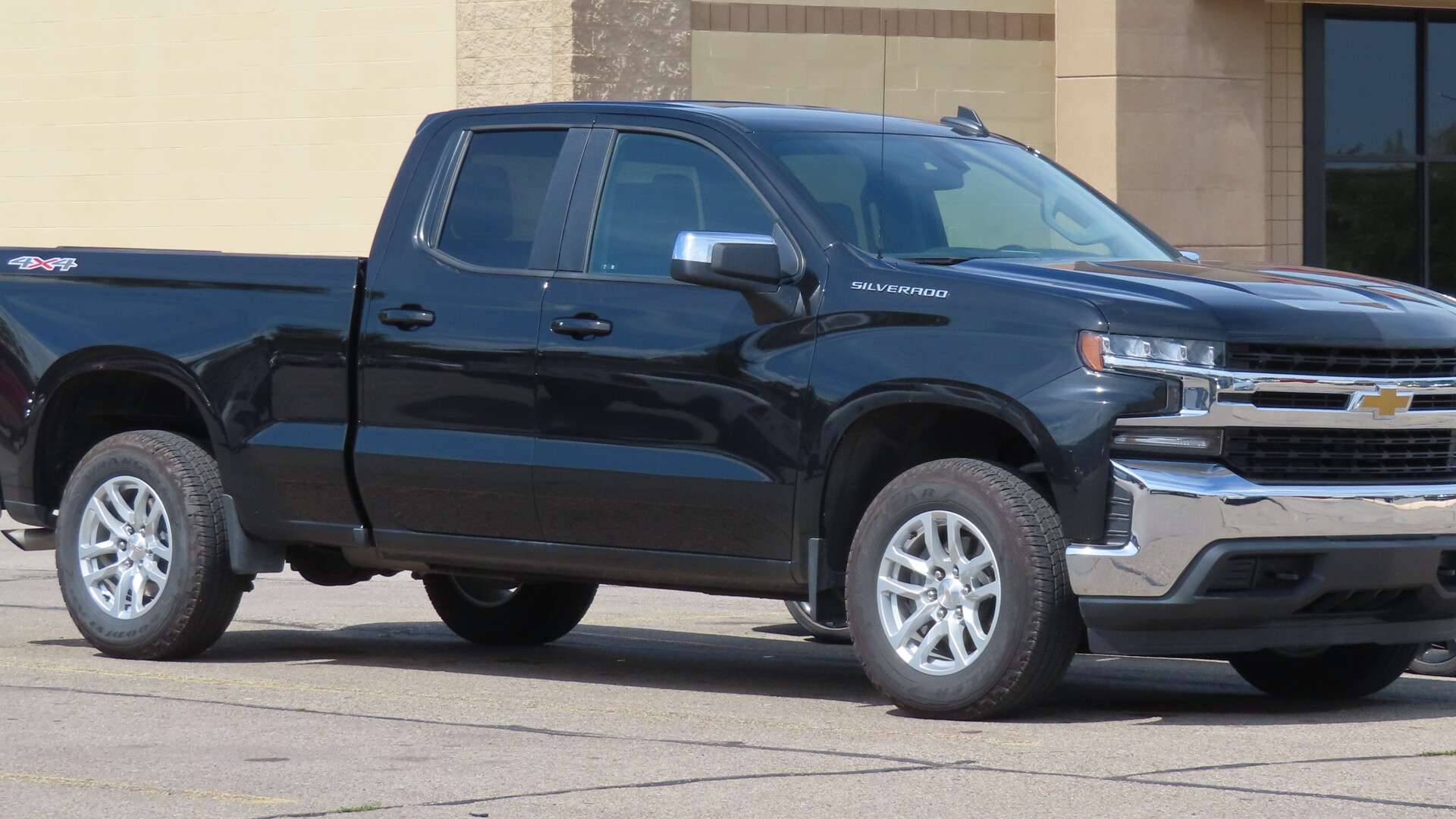 A 2021 Chevrolet Silverado 1500 pickup, front three-quarter view
