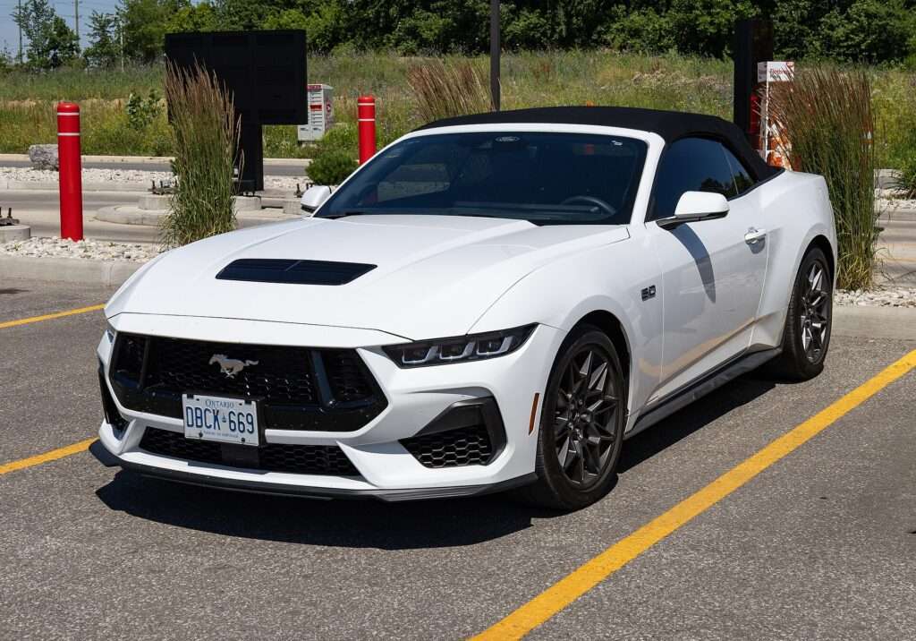 White 2024 Ford Mustang GT convertible parked in a lot