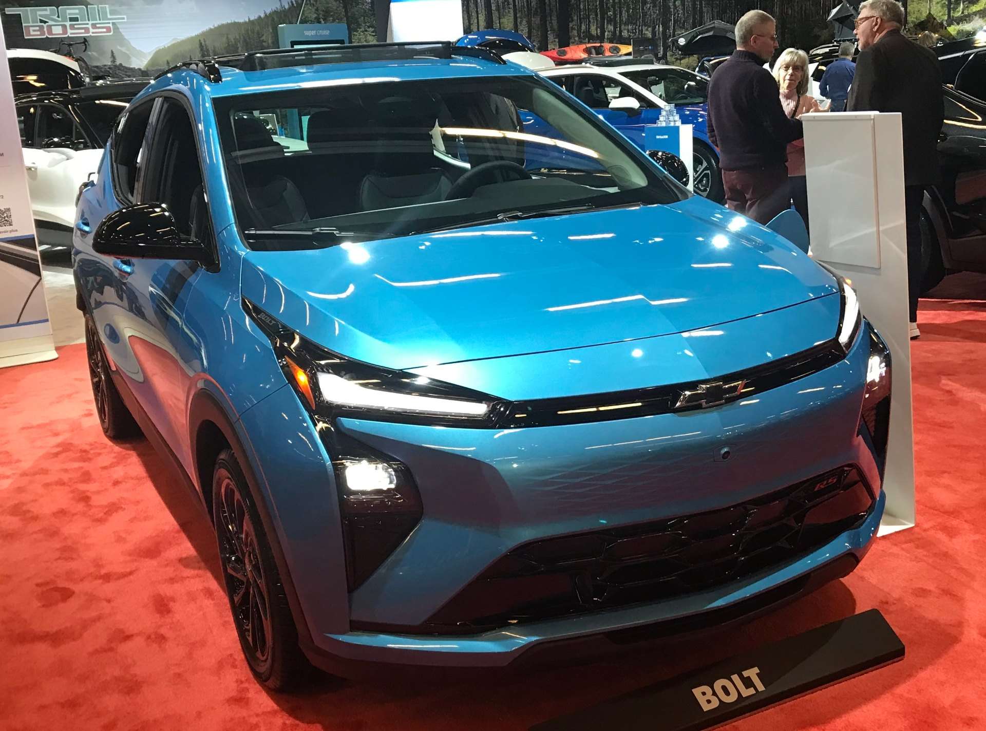A blue 2027 Chevrolet Bolt on display at the 2026 Montreal auto show
