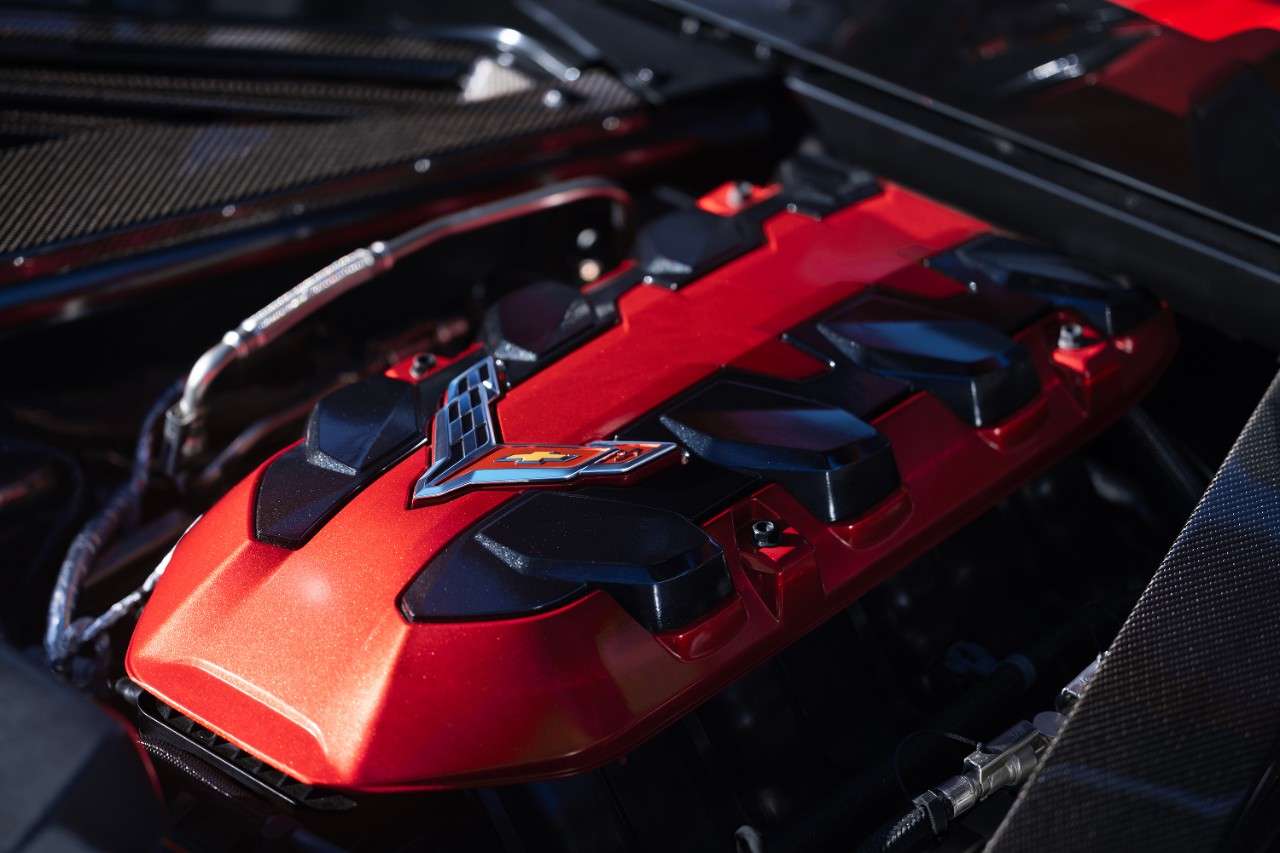 The red engine cover of the 6.7-liter LS6 V8 in a 2027 Chevrolet Corvette