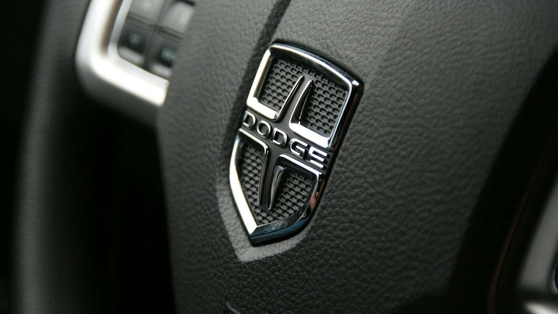 black and silver car steering wheel