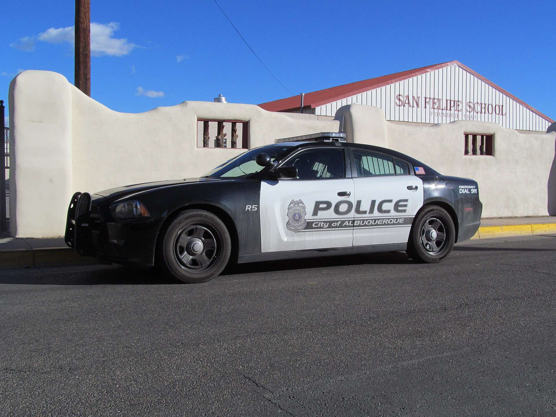 Albuquerque Police Department traffic unit vehicle parked on a city street