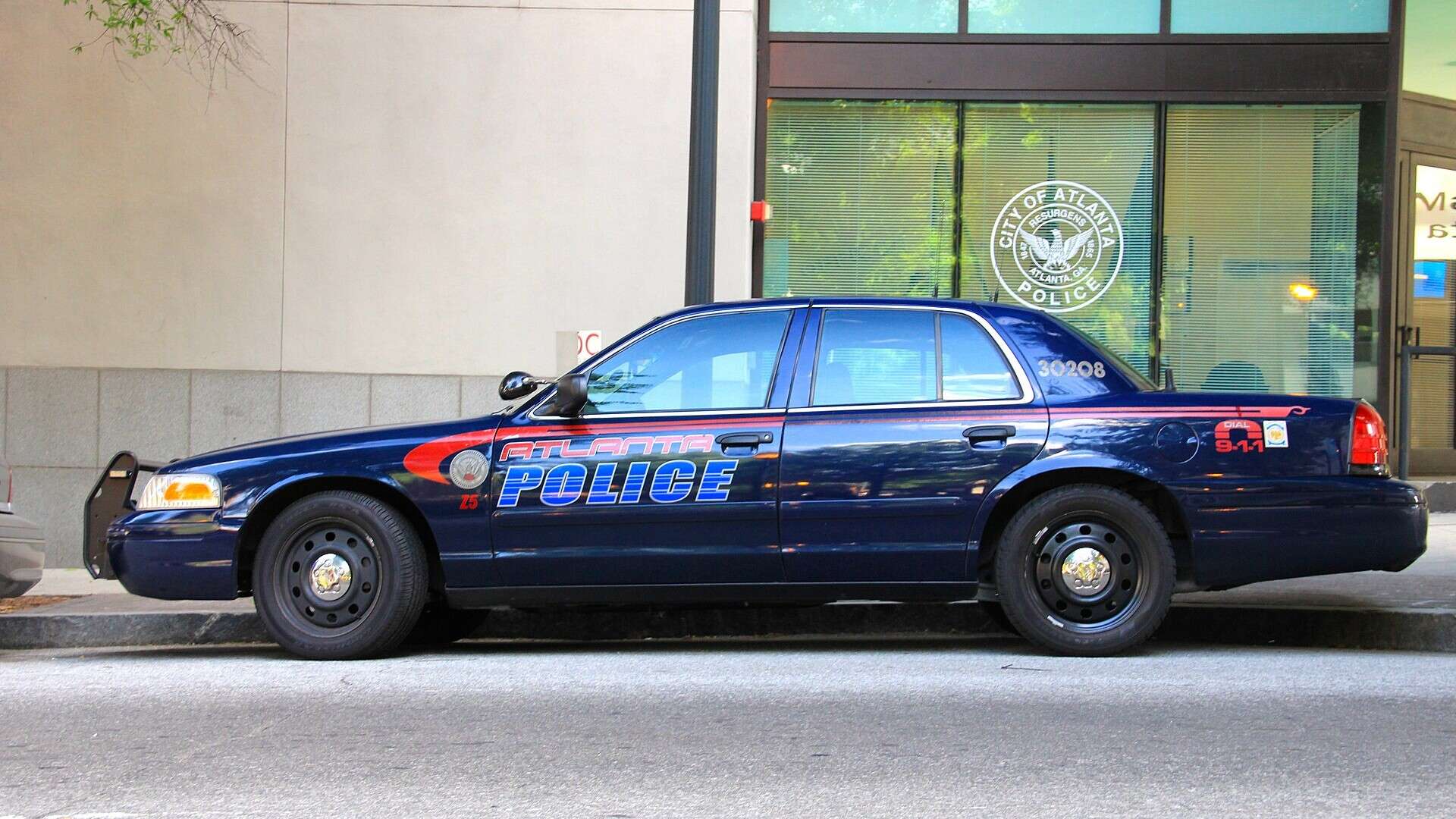 An Atlanta Police Department Ford Crown Victoria Police Interceptor parked on a city street