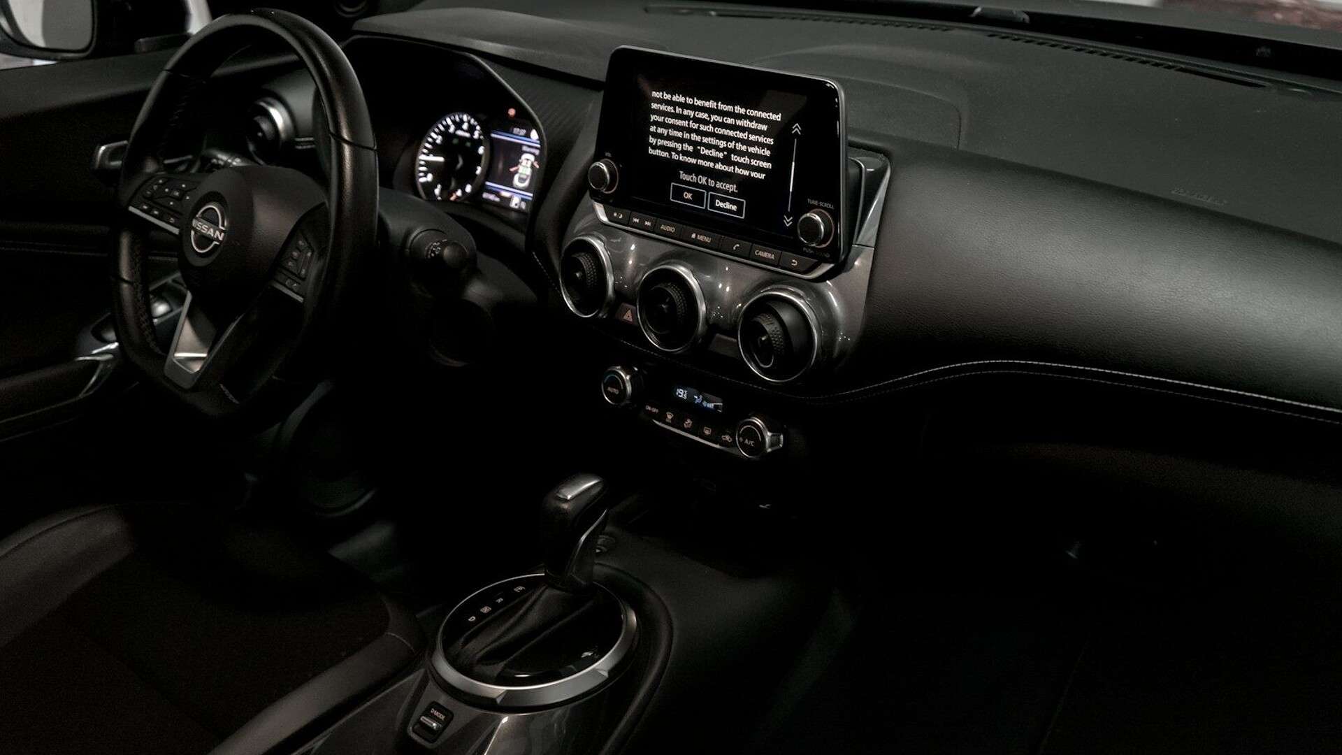 Modern car interior with dashboard and infotainment screen