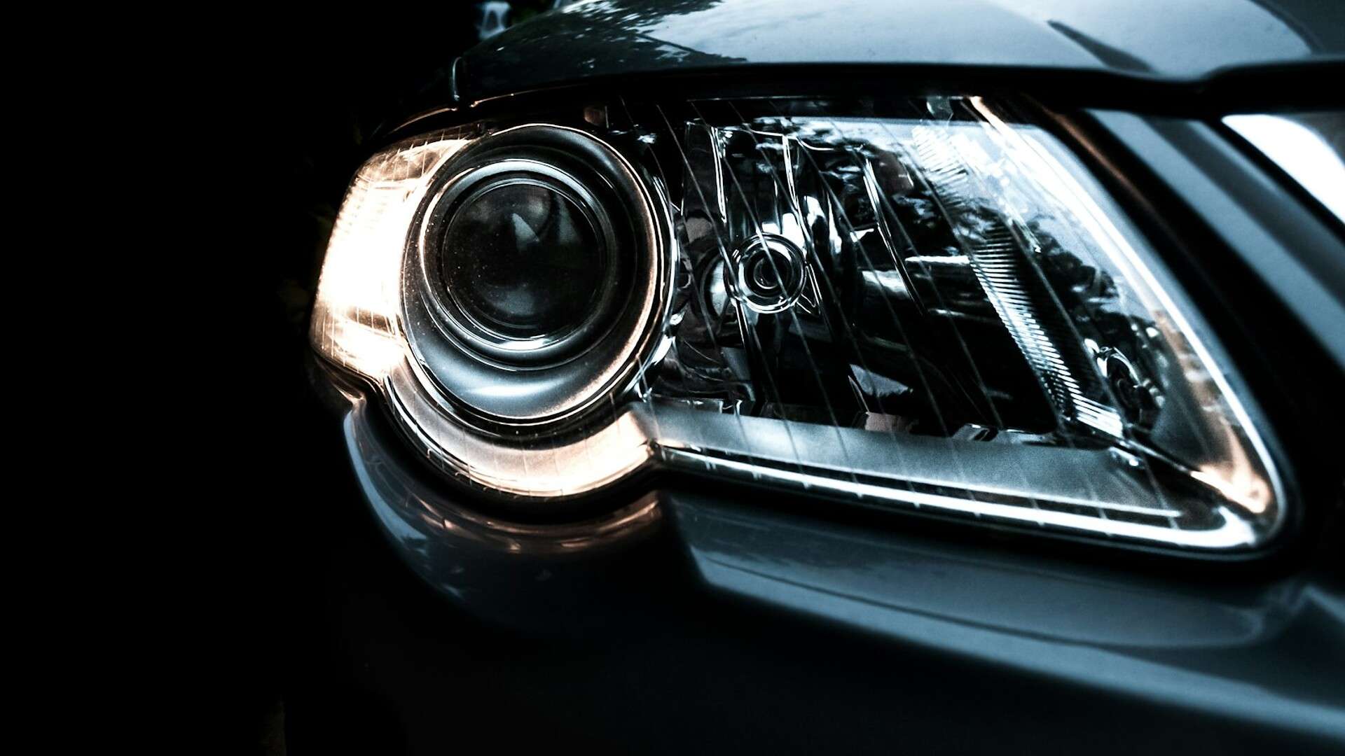 Close-up of an illuminated LED vehicle headlight