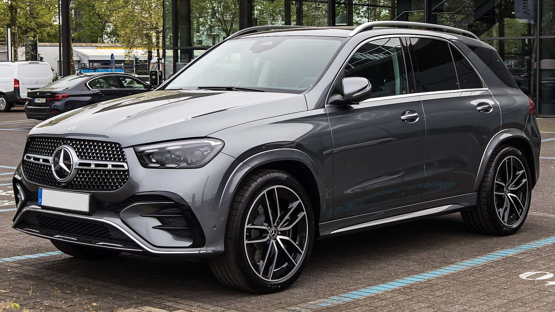 Gray Mercedes-Benz GLE SUV, V167 facelift, front three-quarter view