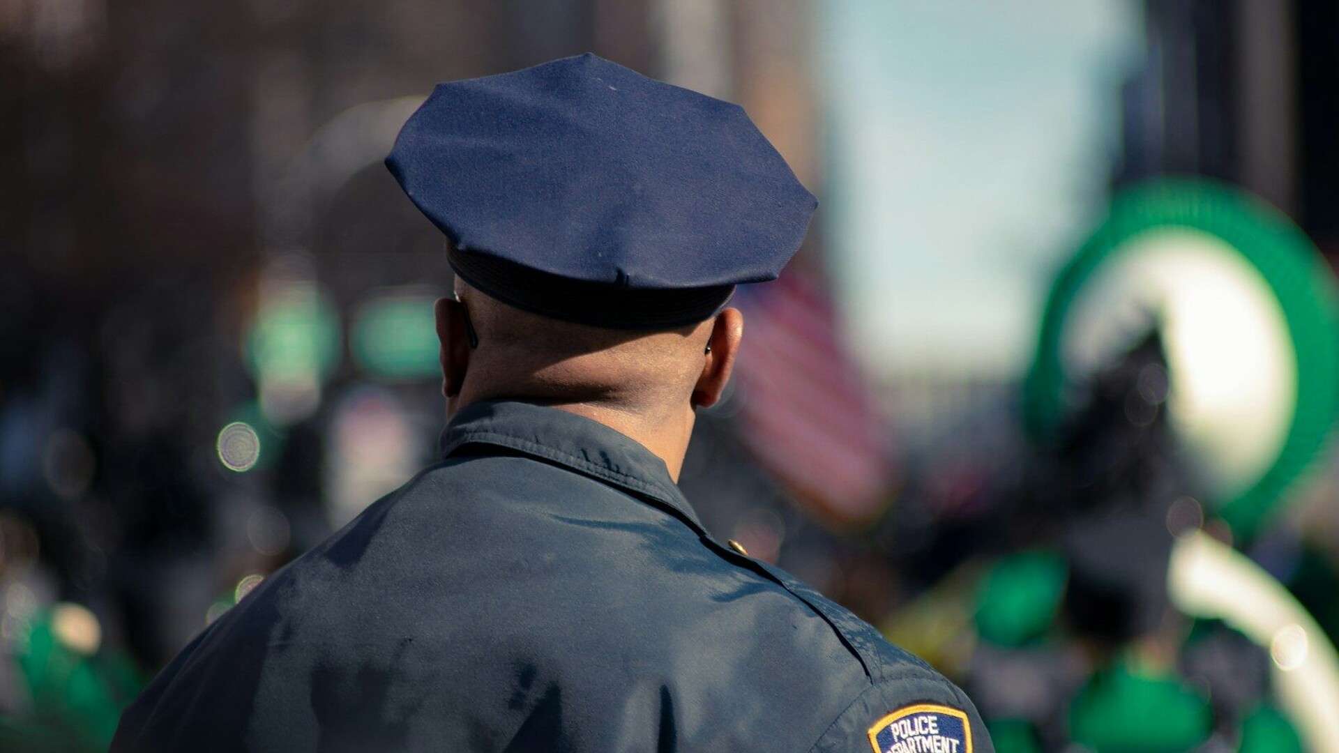 man wearing police uniform selective focus photo
