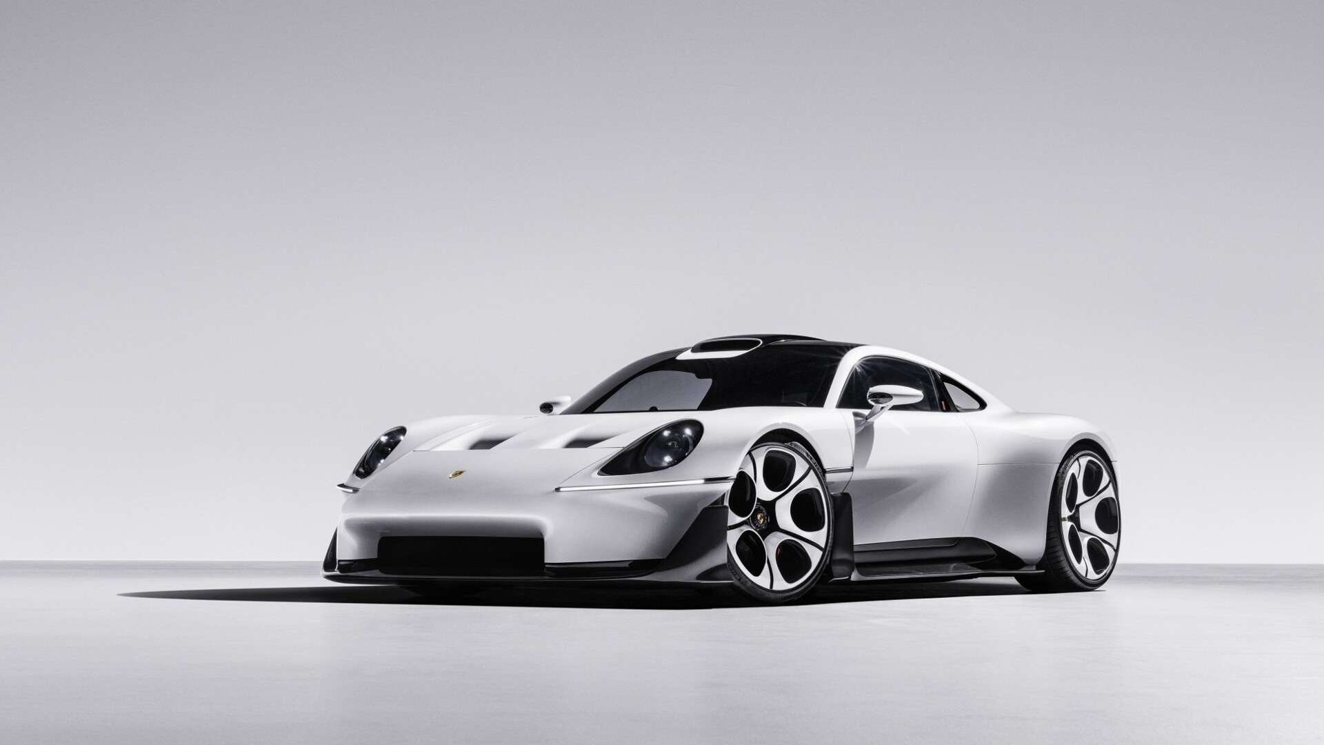 White Porsche Mission S vision model mid-engine supercar, front three-quarter view