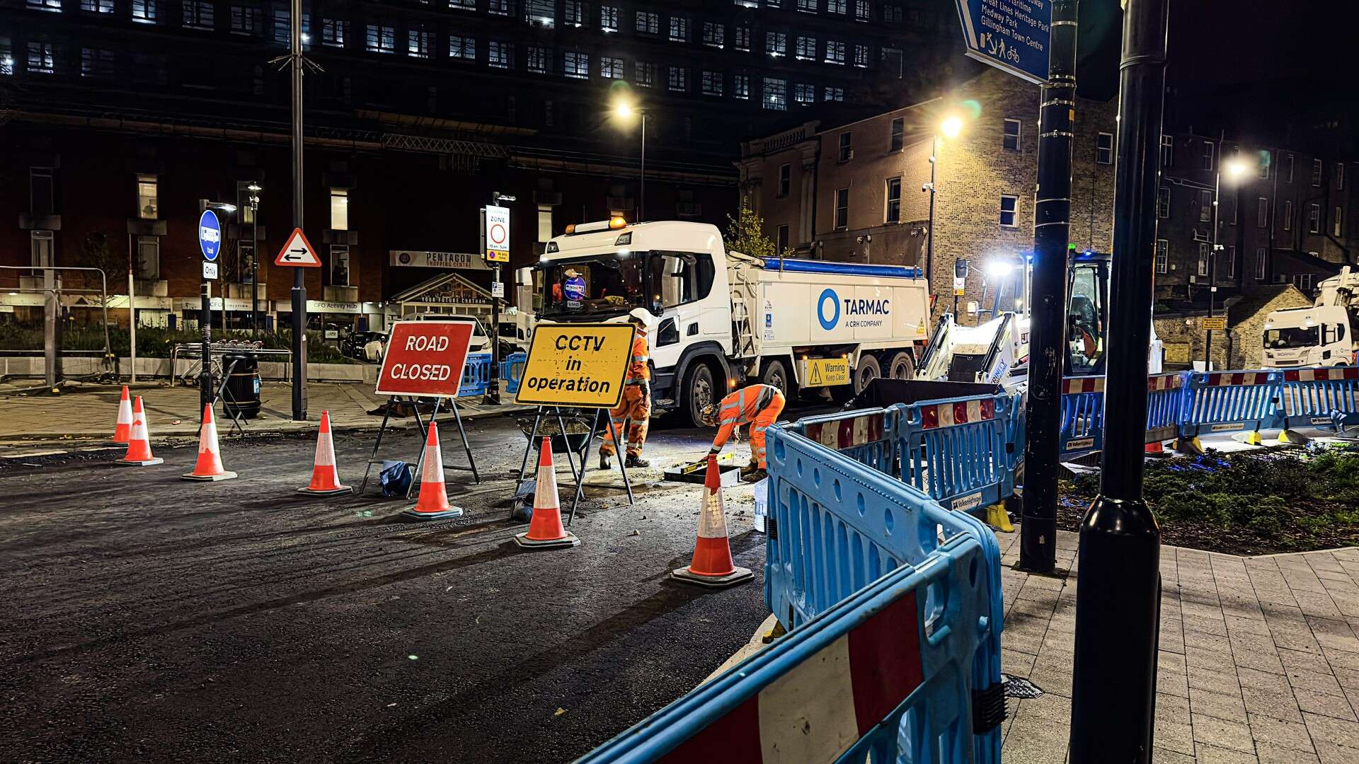 Road crew working at night on a closed road