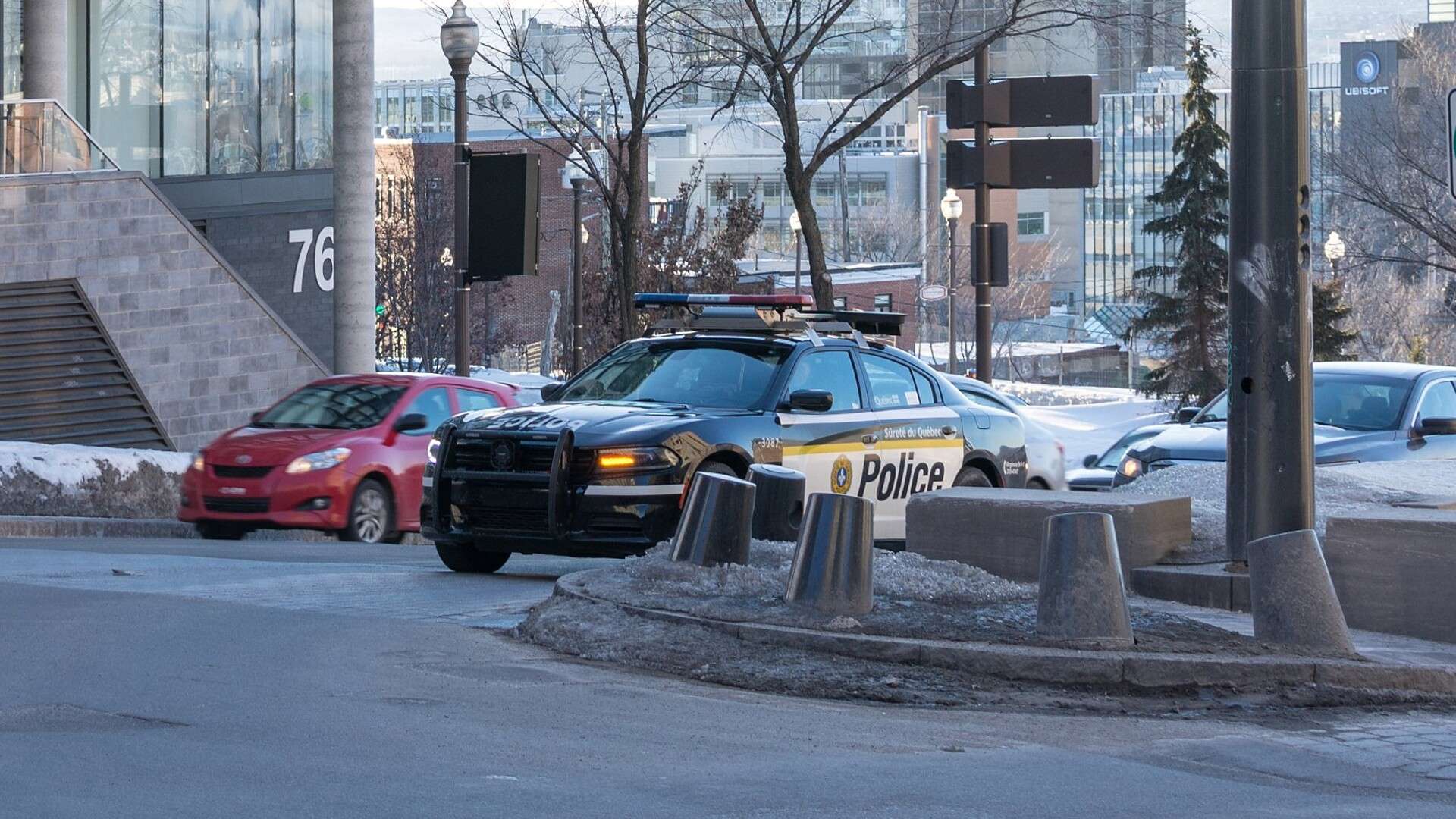 Sûreté du Québec Dodge Charger police cruiser parked on a snowy street in Quebec City