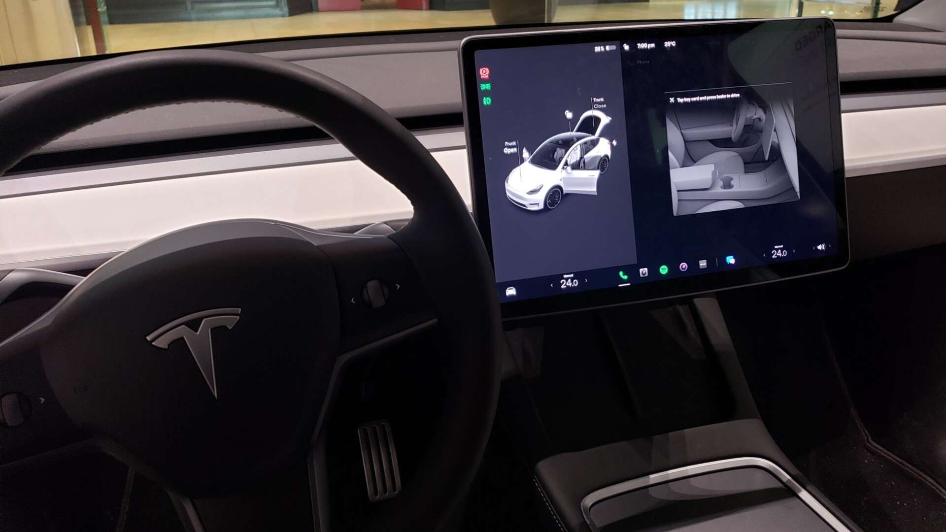 Dashboard, steering wheel and touchscreen inside a Tesla Model 3