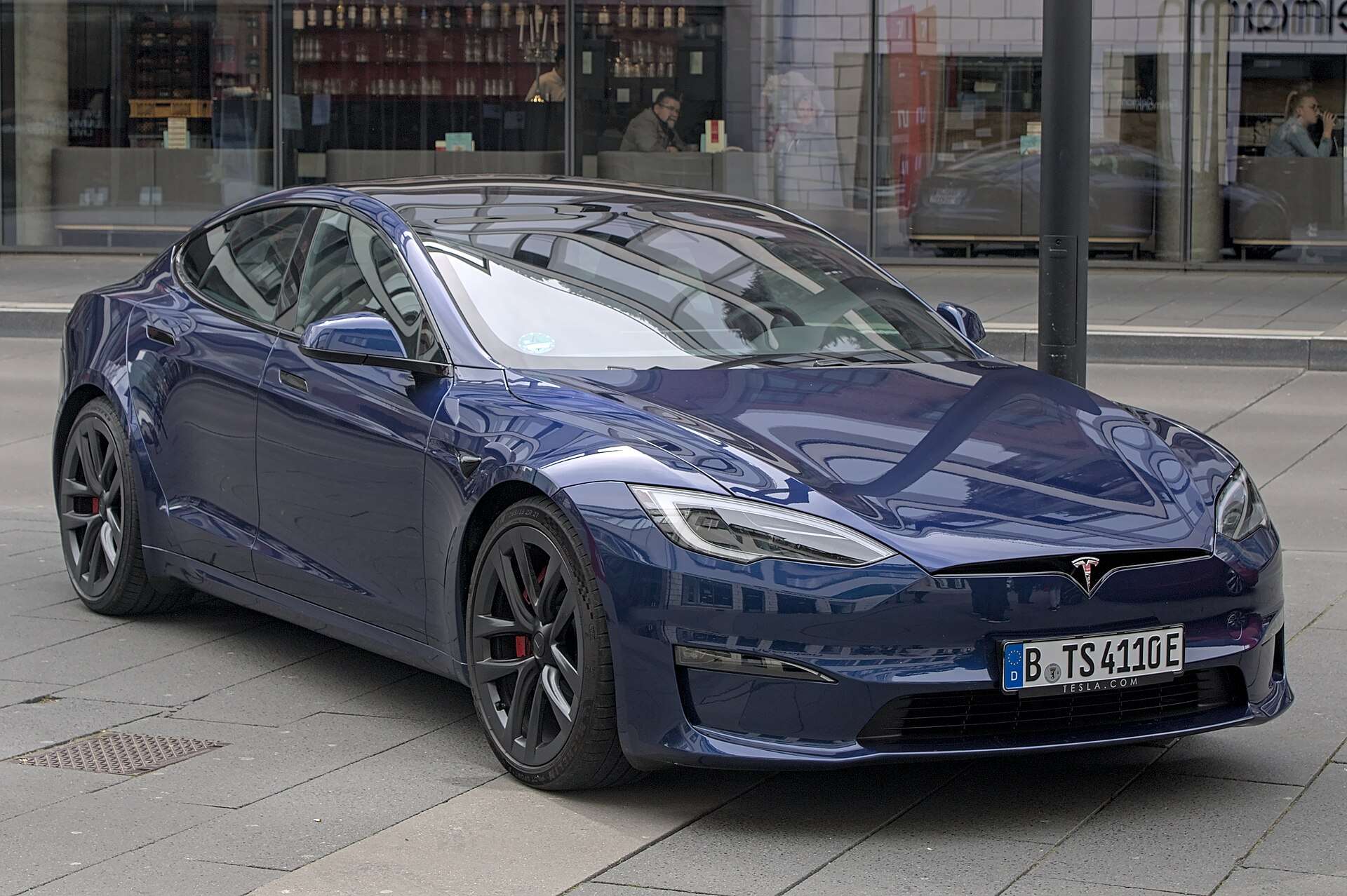 Tesla Model S Plaid parked at a car show