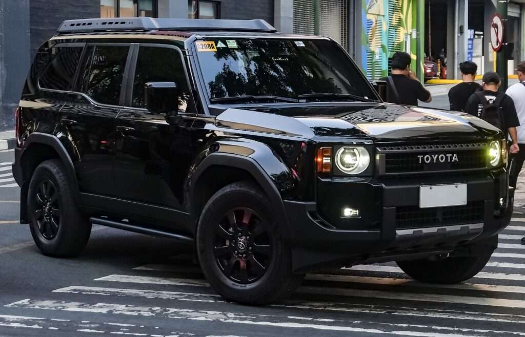 A dark gray Toyota Land Cruiser First Edition with the i-FORCE MAX hybrid powertrain