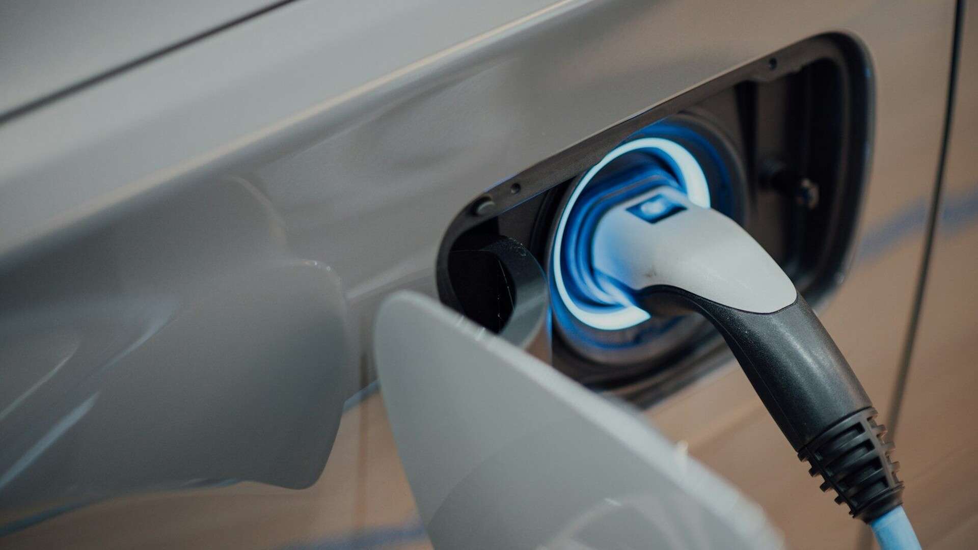 electric vehicle charger plugged into car